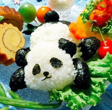 Onigiri representing a panda with seaweed