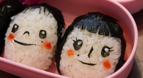 Two Onigiri with painted faces